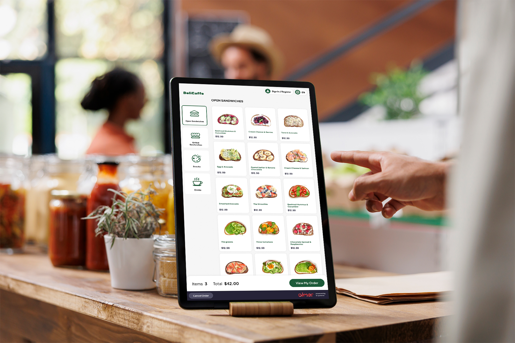 Aimer self-ordering screen in a cafe, from the AutoFront brochure